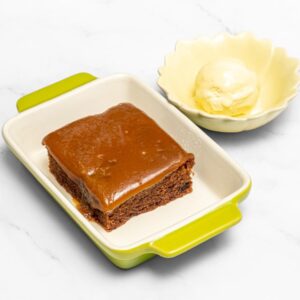 CHOCOLATE BROWNIE SERVED WITH VANILLA ICE CREAM